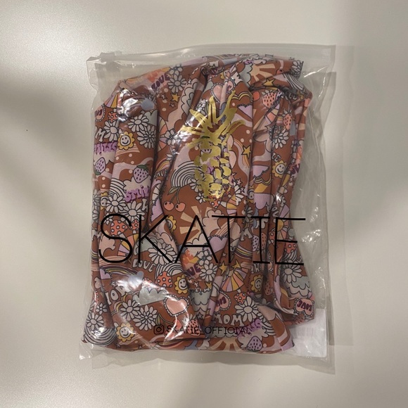 Never worn Skatie one piece - Picture 2 of 2